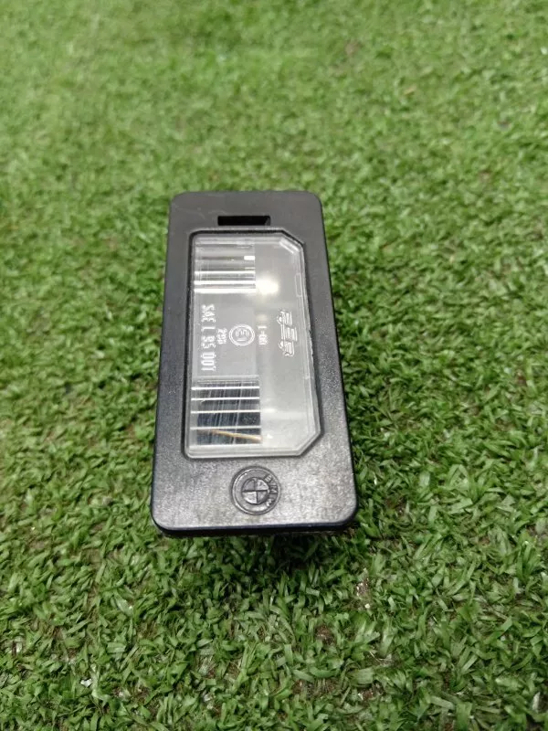 Фонарь подсветки номера