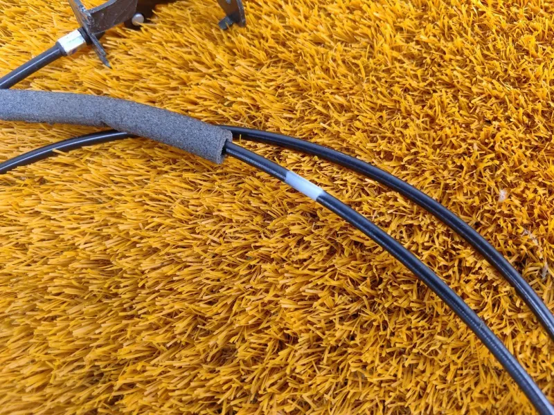 Трос лючка топливного бака