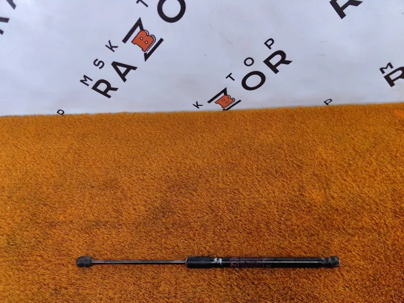 Амортизатор крышки багажника