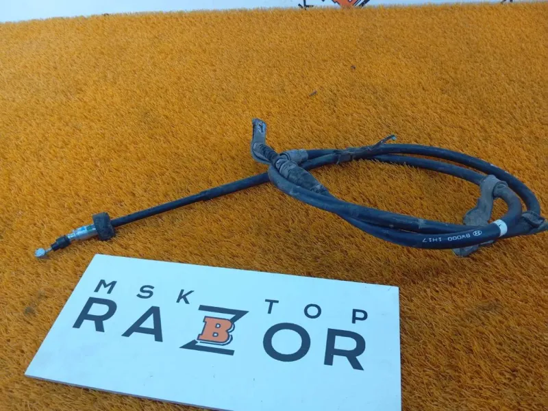 Трос стояночного тормоза