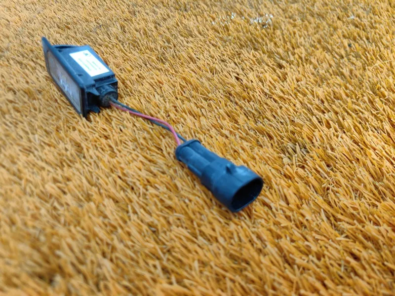 Фонарь подсветки номера