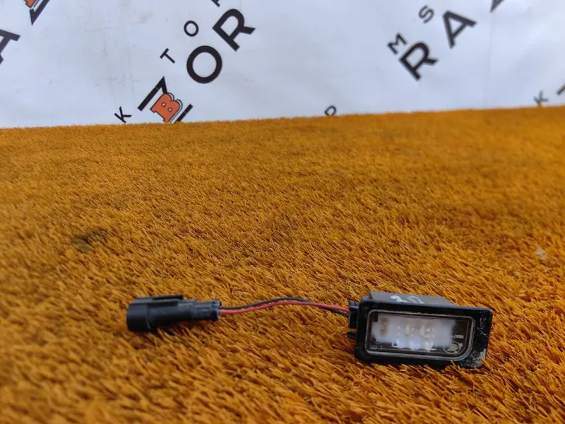 Фонарь подсветки номера