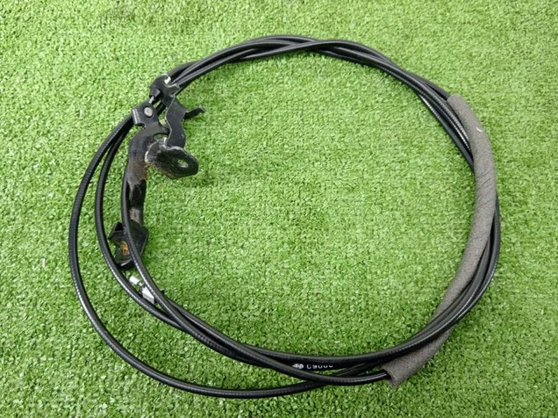 Трос лючка топливного бака